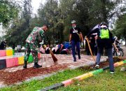 Babinsa Gampong Jawa Dampingi Personil BNNK Pembersihan di Titik Nol Kota Banda Aceh