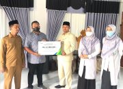 Bupati Aceh Besar Serahkan Jaminan Kematian untuk Ahli Waris Penjaga Kuburan Massal Korban Tsunami