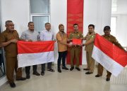 Sambut HUT RI Ke-77, Pj Bupati dan Ketua DPRK Aceh Besar Awali Gerakan 10 Juta Bendera Merah Putih