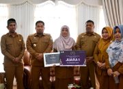 Pj Bupati Aceh Besar Berikan Apresiasi kepada Guru Berprestasi