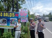 Polantas Pijay Pasang Spanduk Untuk Keselamatan Berlalulintas di Titik Rawan Kecelakaan