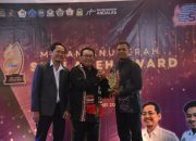 Pj Bupati Aceh Besar Terima SMSI Award Kategori Figur Peduli Ketahanan Pangan dan Kesejahteraan Petani
