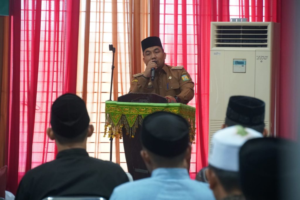 Buka PKU, Pj Bupati Aceh Besar Ajak Ulama Bersinergi Berantas Riba