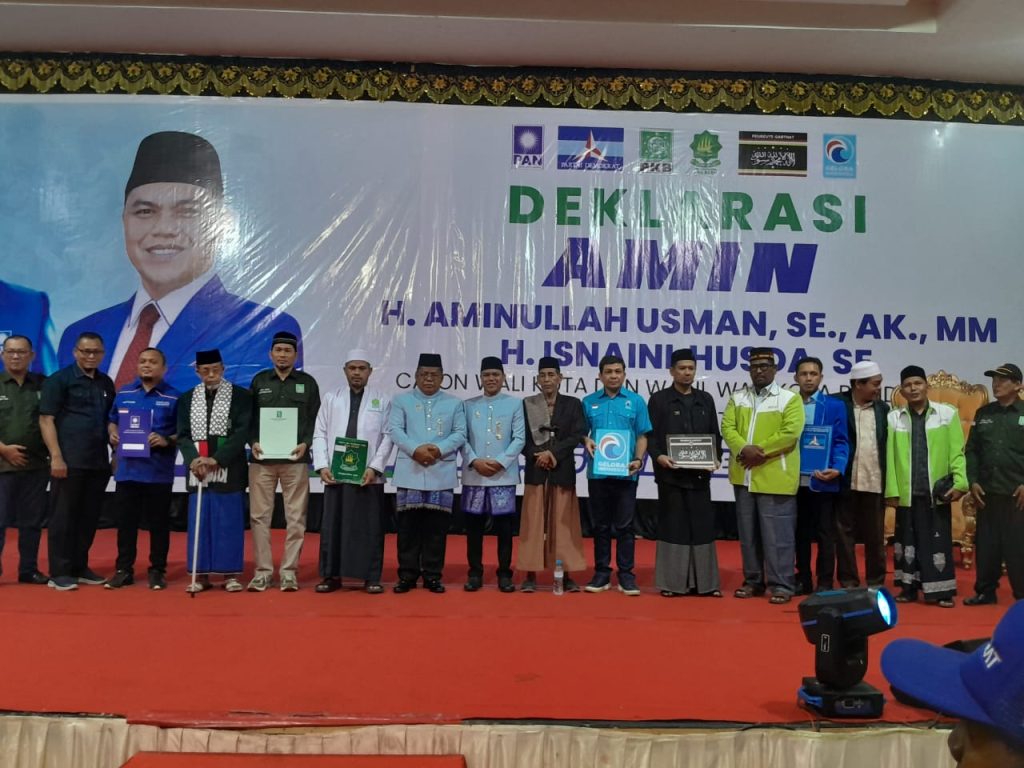 Usai Deklarasi, Ribuan Pendukung Antarkan Pasangan Aminullah-Isnaini Mendaftar ke KIP