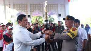 Kapolres Aceh Besar Sambut Kedatangan Kirab Api PON XXI Aceh-Sumut 2024