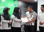 Kadisdikbud Aceh Besar Tutup Pelatihan Metode Pengajaran dan Pembelajaran Kerjasama dengan YKMI