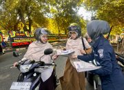 Bidhumas Polda Aceh Bagikan Koran Gratis kepada Masyarakat pada Momen Hari Bhayangkara ke-79