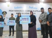 Pemko Banda Aceh Serahkan Bonus Kafilah Berprestasi, Illiza Targetkan Rebut Kembali Juara Umum MTQ Aceh 2027