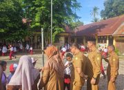 Wakili Bupati, Kasatpol PP dan WH Aceh Besar Suntik Semangat Siswa di Hari Pertama Sekolah
